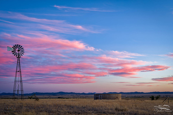 Pastel Sunset across the Valley Plain